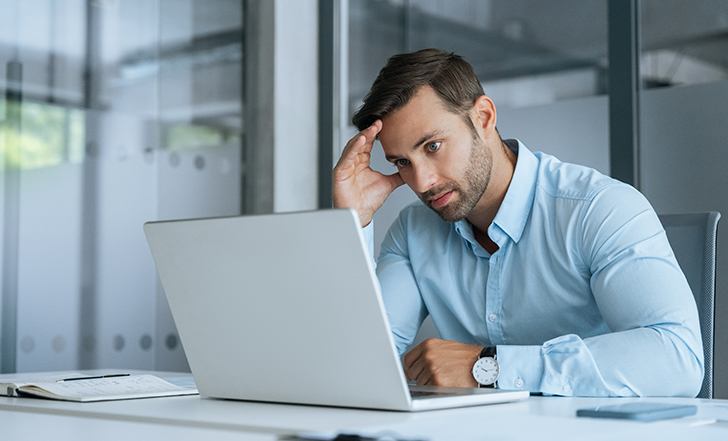 Business owner reviewing Google Ads lead quality and campaign performance